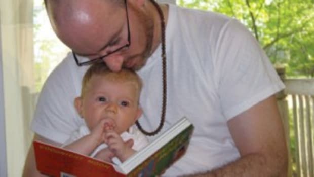 Co-author Noah Fleisher with his then baby daughter, Fiona. (All photos featured in "Collecting Children's Books").