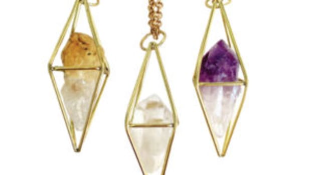 Caged crystal amulet necklaces