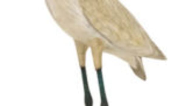 A. Elmer Crowell carved snowy egret, $48,000