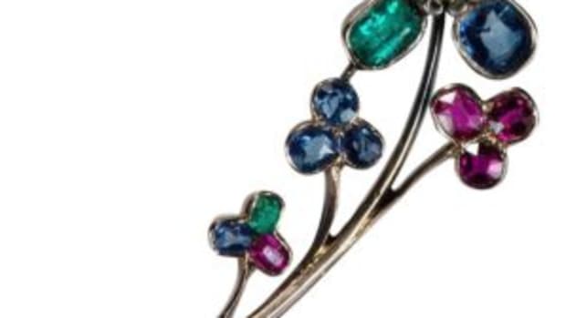 Old Euro Diamond Cushion Cut Emerald Ruby Sapphire Brooch 18k Gold Mixed Gemstone Flower Brooch $1,899. Courtesy of Ruby Lane