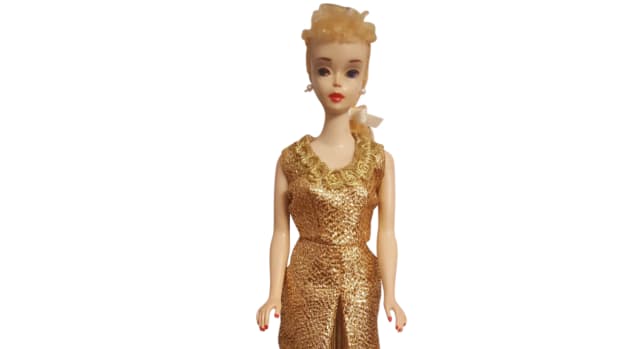  Barbie remains the queen of dolls. Vintage #3 Blonde ponytail Barbie Doll with brown liner and looking glamorous in her gold gown; $795. Courtesy of Old is New: rubylane.com/shop/vintage-finds
