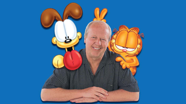 Cartoonist Jim Davis with his pals Garfield and Odie.
