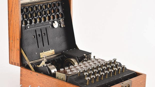 Enigma I electromechanical cipher machine, 1935, featuring an ebonite Steckerbrett (plugboard) on the front, which was exclusive to the German armed forces and exponentially increased the complexity of the code. This version of the Enigma is sometimes referred to as the Heeres (Army) Enigma, Wehrmacht Enigma, or Luftwaffe Enigma due to its military-specific application. This particular example boasts rare characteristics found only on early production machines: metal extra Stecker cable holders in the lid, rotors with all-metal construction, and original metal badges and tags. It sold at RR Auction for $338,630.