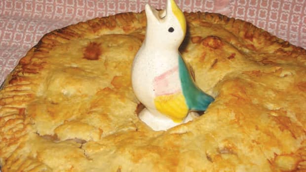 A tri-colored Morton 1950s pie bird hard at work in an apple pie; $25-$75.
