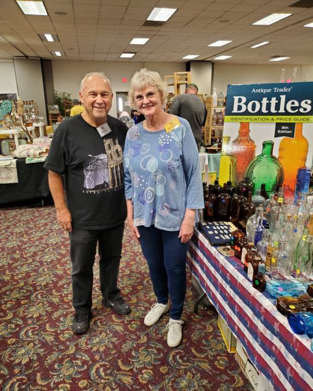 Michael Polak and Phoenix Antiques Bottles & Collectibles Club’s Show chair Betty Hartnett