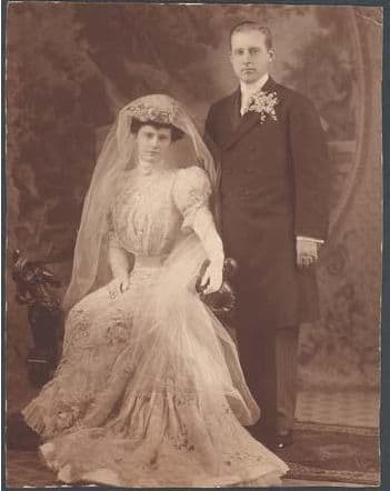 Marjorie and Edward pose for their wedding portrait.