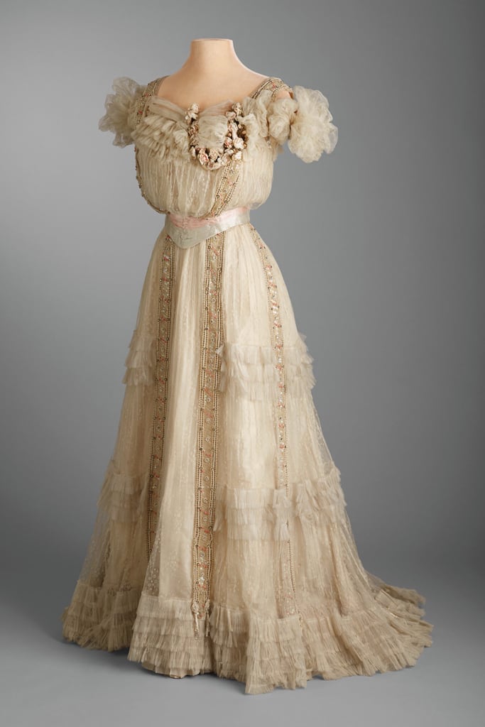 Post’s Sweet 16 evening dress, 1903, of white spotted tulle, ivory silk taffeta and cream silk velvet, embellished with coral beads and clear rhinestones.