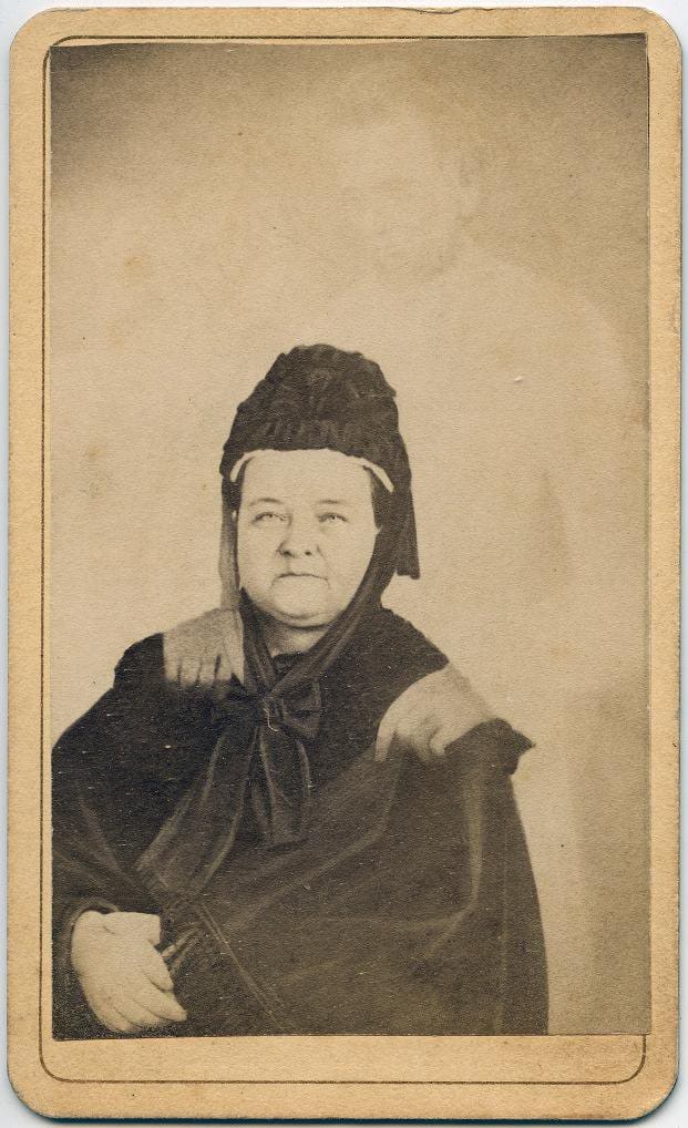 William Mumler's photo of Mary Todd Lincoln, with the ghostly figure of her husband behind her.