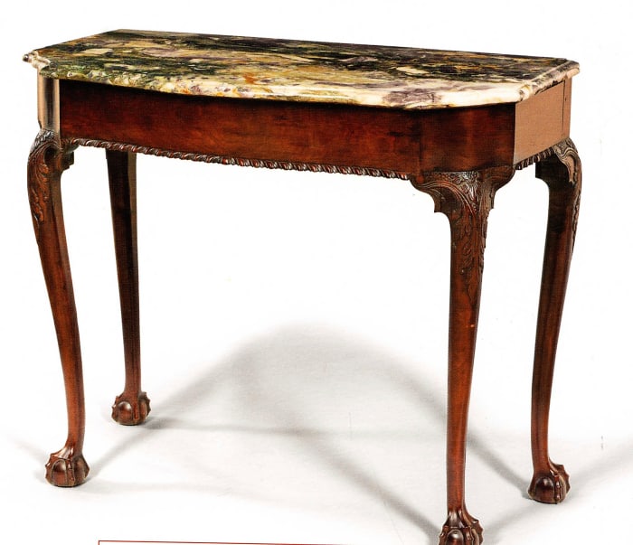 This rare and important Chippendale carved mahogany marble-top table  from the John and Marilyn Keane Collection sold for $396,500.