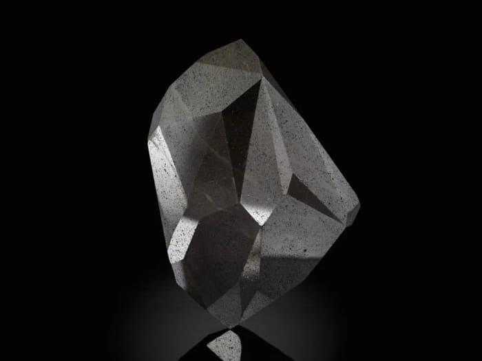 The 555.55-carat Black Diamond, "The Enigma," is predicted to sell for up to $7 million at Sotheby's.