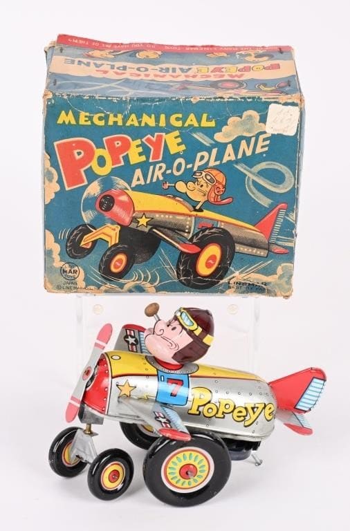 Linemar tin wind-up Mechanical Popeye Air-O-Plane, all original and complete with pipe and propeller, and original pictorial box. Sold for $10,500 against an estimate of $6,000-$8,000.