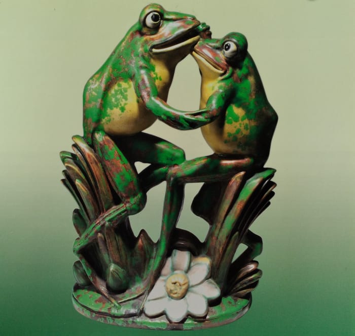 This rare Weller Coppertone sculpture of dancing frogs, 1920s, 16-3/4" x 11-1/2" x 6", sold at auction in 2015 for $4,750.