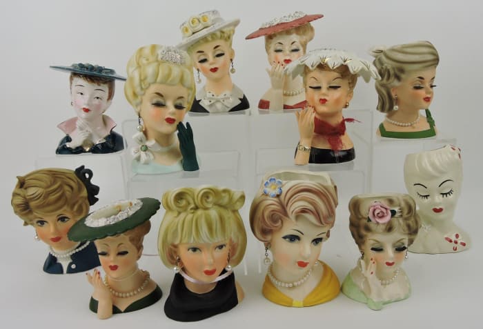 Lot of 12 Napco and Inarco lady head vases, 4” to 6” h; $200.