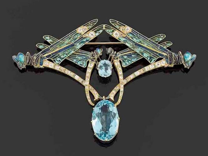 Lalique “four dragonflies”gold and aquamarine brooch with plique-à-jour enamel for the wings, c. 1900; $271,630.