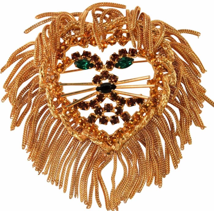 Costume jewelry brooch by Dominique.