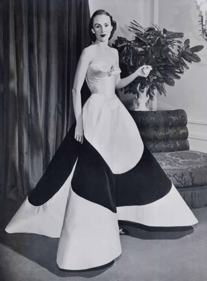 Austine Cassini Hearst wearing her Charles James’ Clover Leaf gown at the 1953 March of Dimes fashion show.