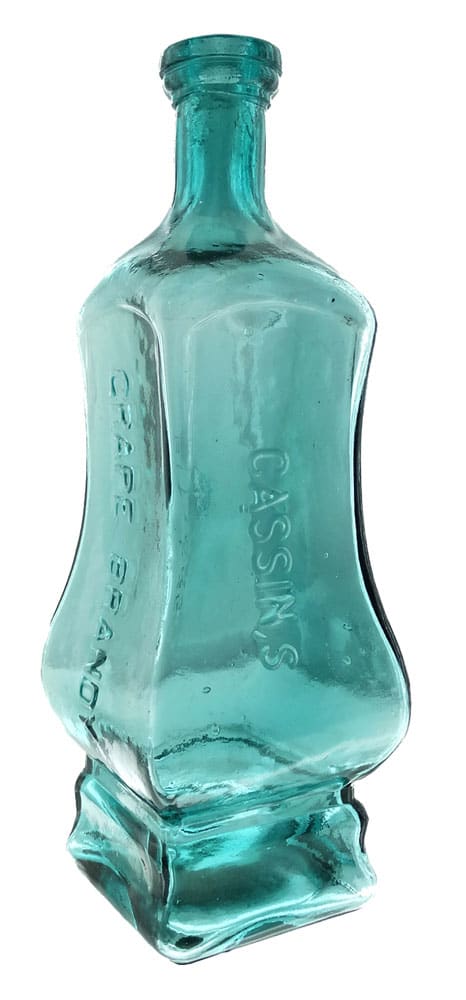 Cassin’s Grape Brandy Bitters bottle, circa 1860s. Most unusual in shape and produced in two mold variants, this bottle is the earliest produced with approximately ten examples known.