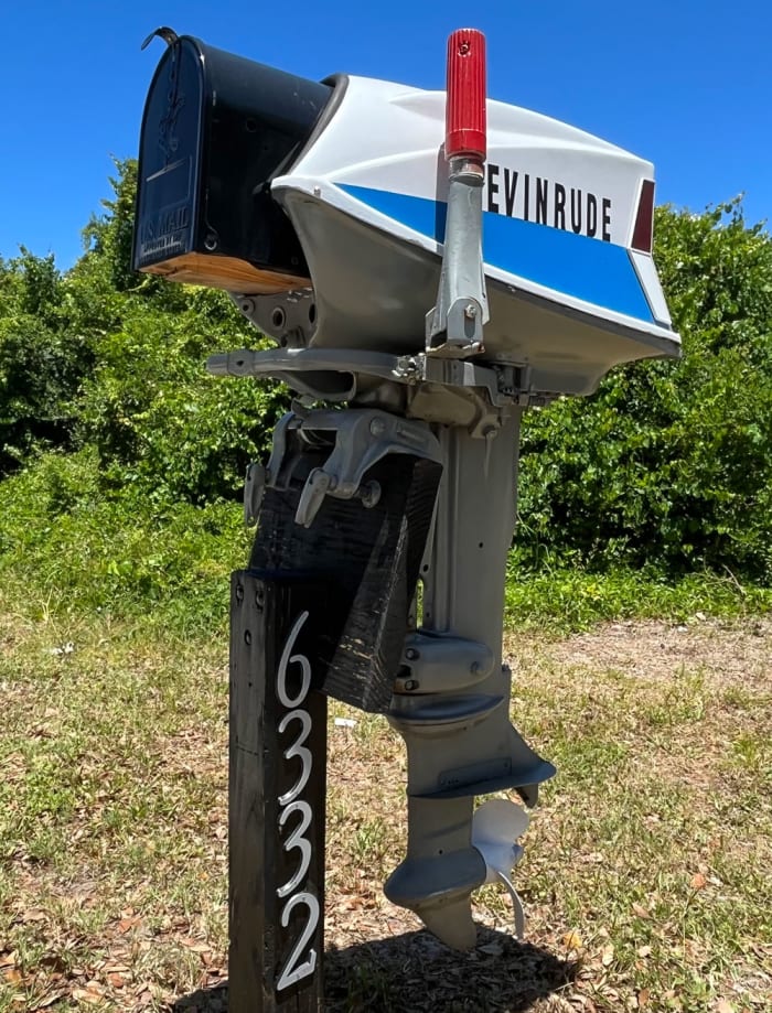 A nautical-themed mailbox made from a 1962 Evinrude outboard motor  handles the mail nicely for Bob and Jan Beach in St. Augustine, Florida.