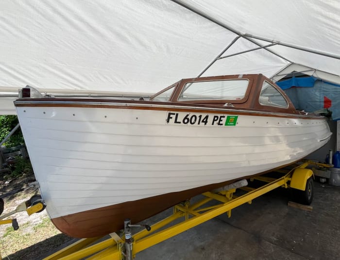 This beautiful 1957 Lyman runabout fitted with a 1962 Evinrude Starflite IV outboard motor belongs to  Jan and Bob Beach, who inherited  it twenty-five years ago.