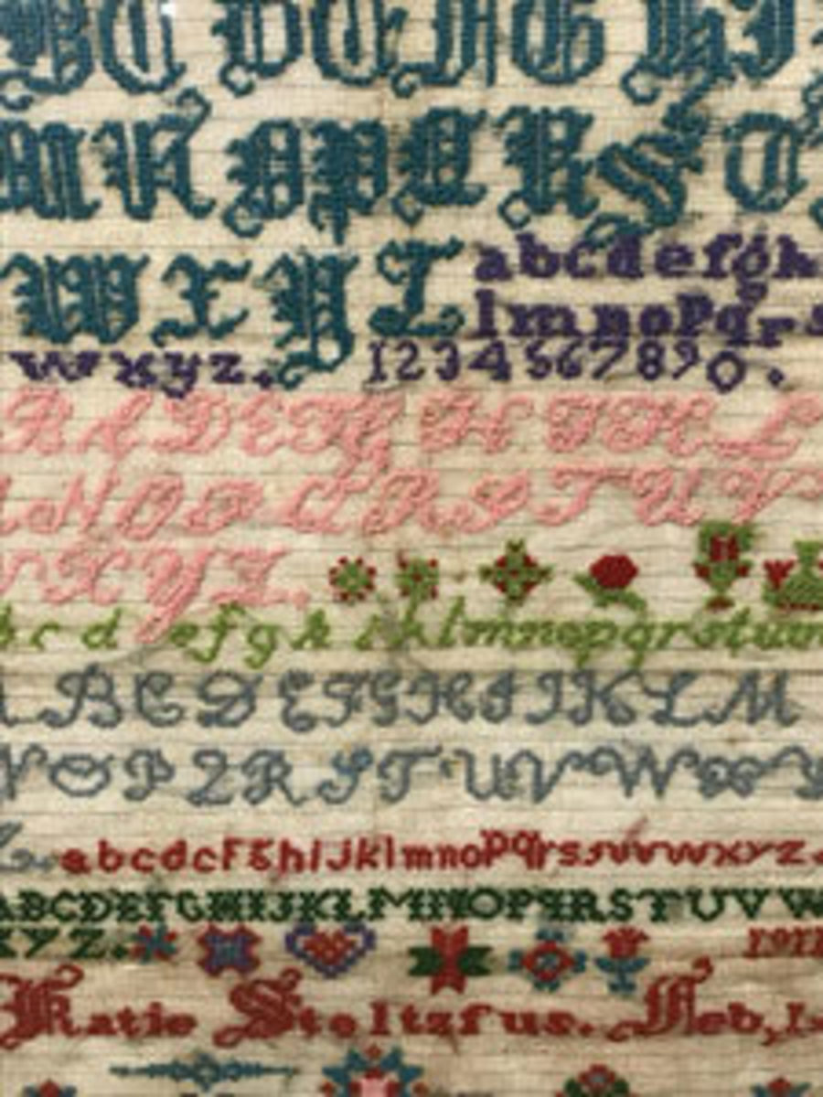  This signed antique Pennsylvania Amish sampler, with signature of “Katie Stoltzfus” and date “Feb. 1, 1911” embroidered along the bottom, sold at the Benefit Shpp auction for $475 against an estimate of $50-$200. It features the alphabet embroidered in various sizes and colors, along with floral motifs throughout, and is approximately 25-3/4” h x 18-1/4” w. Image courtesy of The Benefit Shop