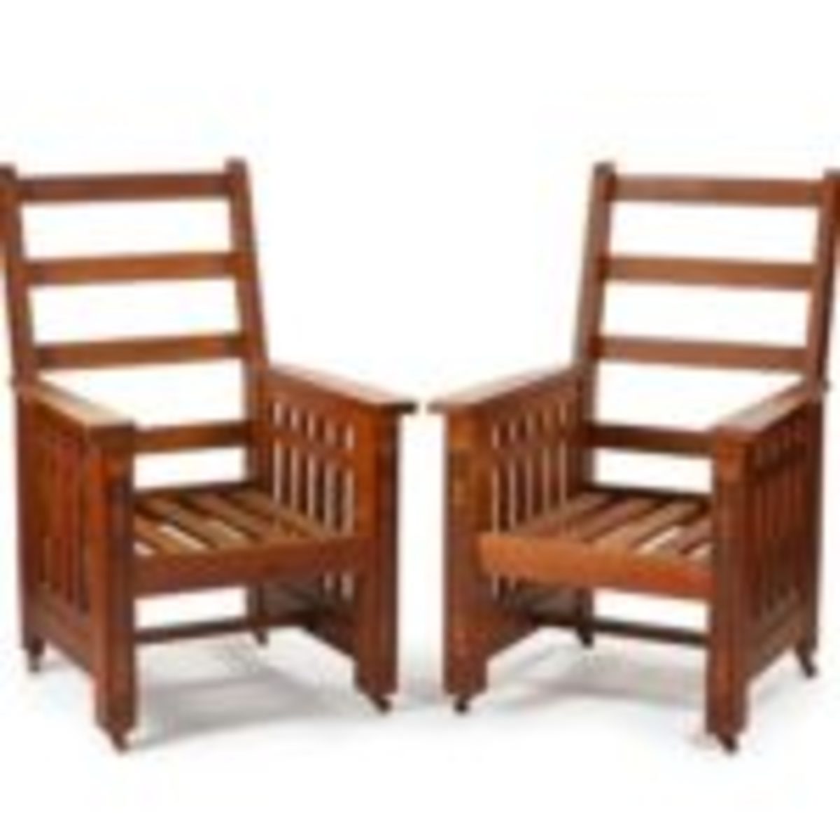 A pair of Shop of the Crafters “Mission Morris” chairs, circa 1910, $8,750.