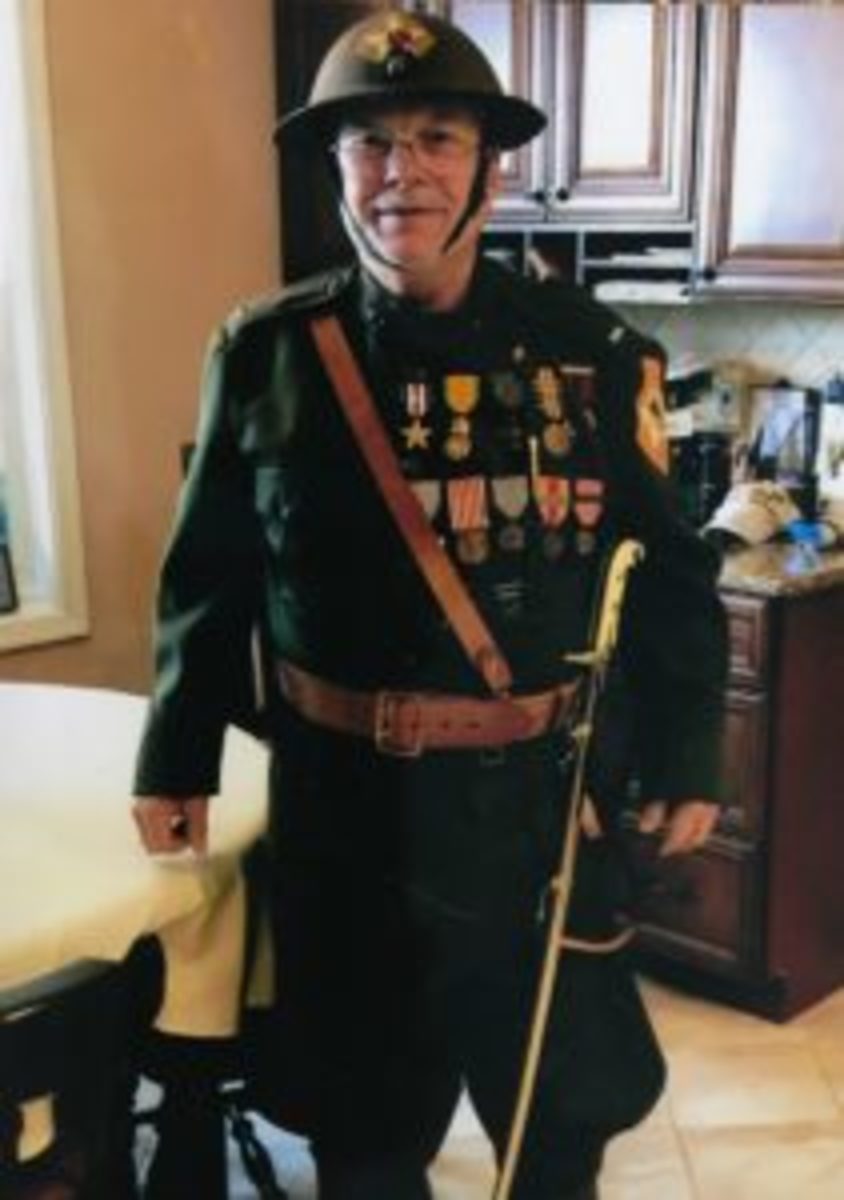  LtCol John K. Williams will be at the AAAA convention wearing an authentic World War I uniform and displaying his WWI Marine recruitment posters and tobacco tins.