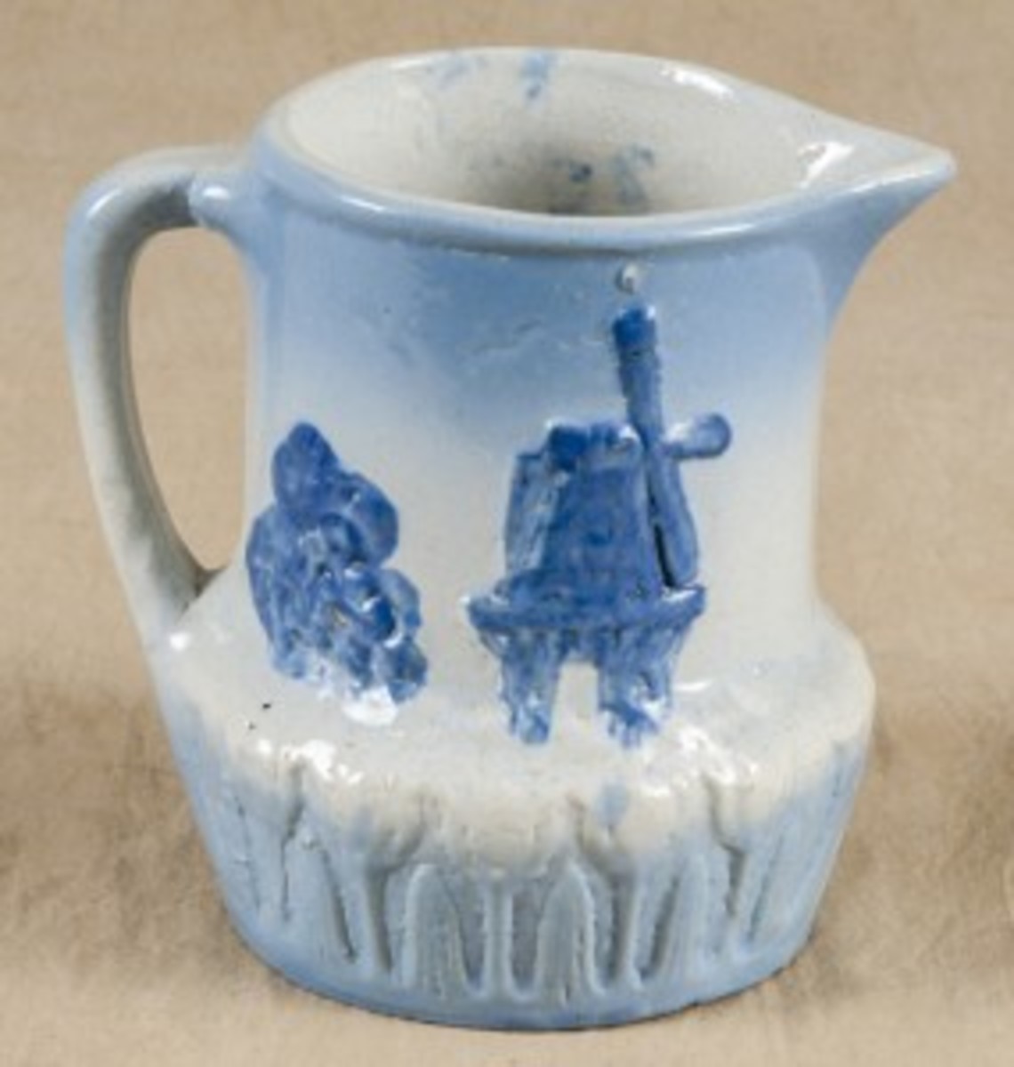 Blue and white stoneware pitcher