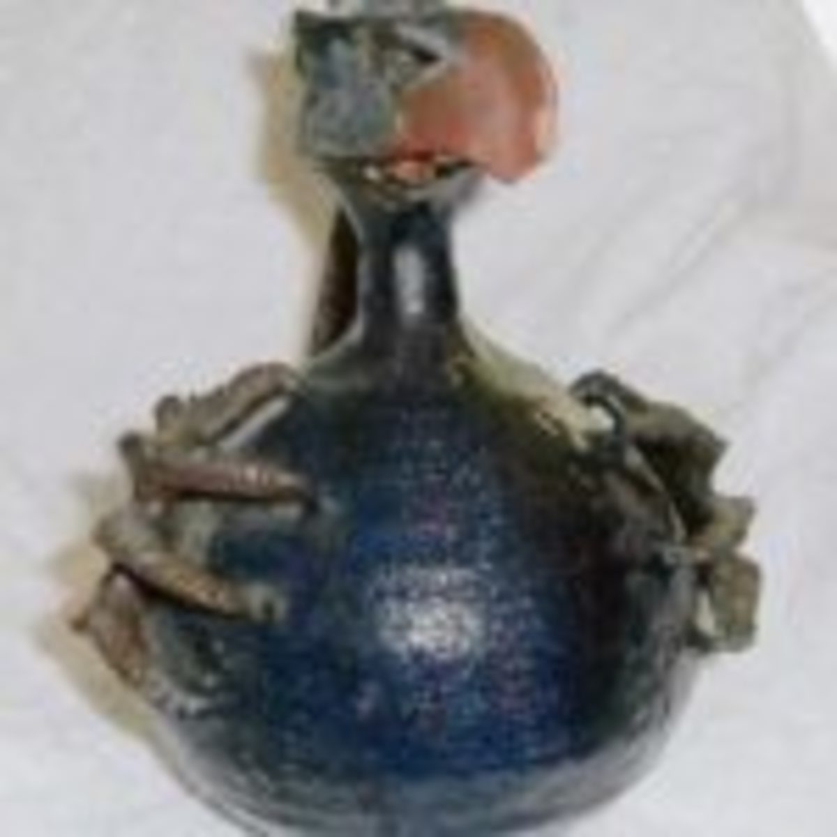 Bird-form stoneware decanter