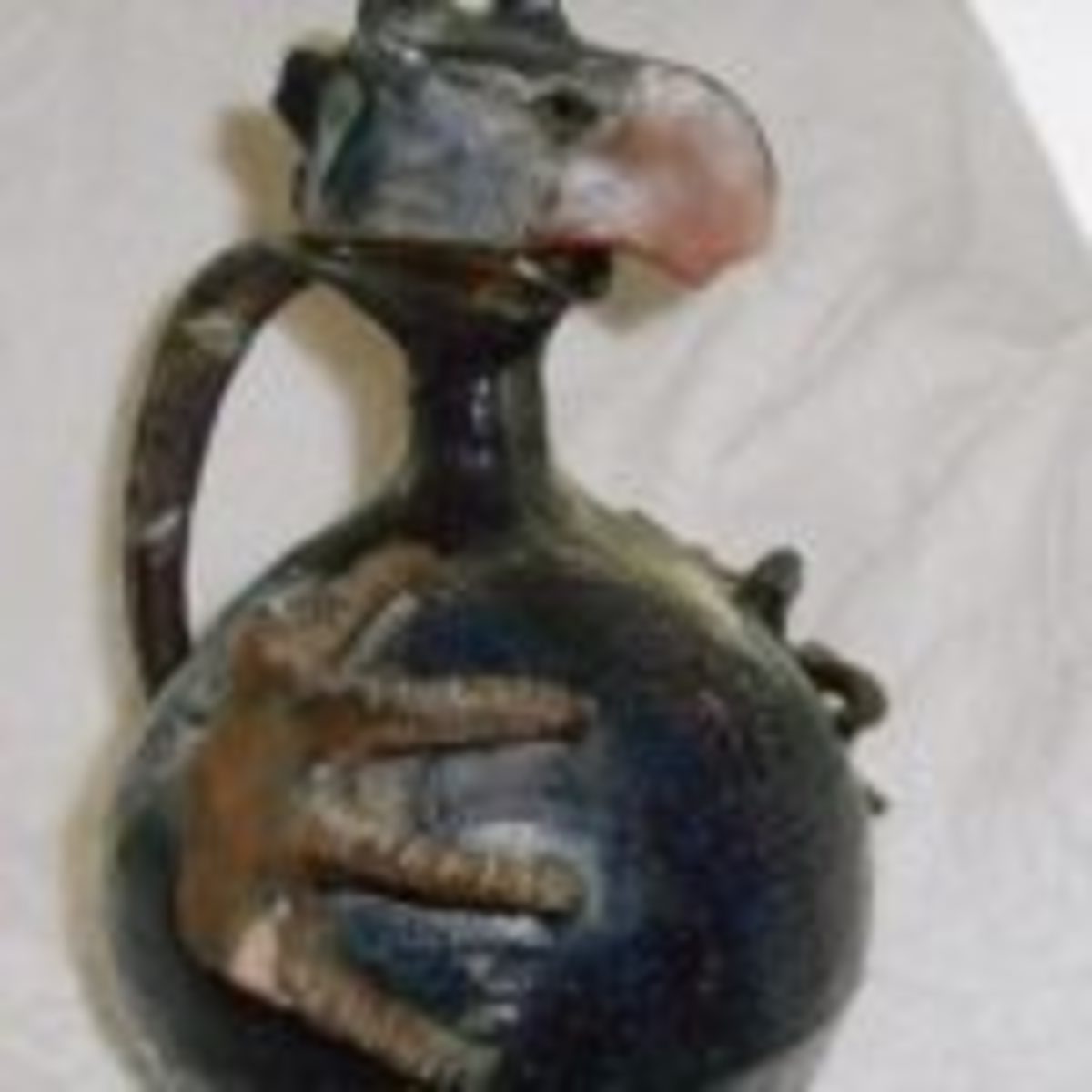 Bird-form stoneware decanter
