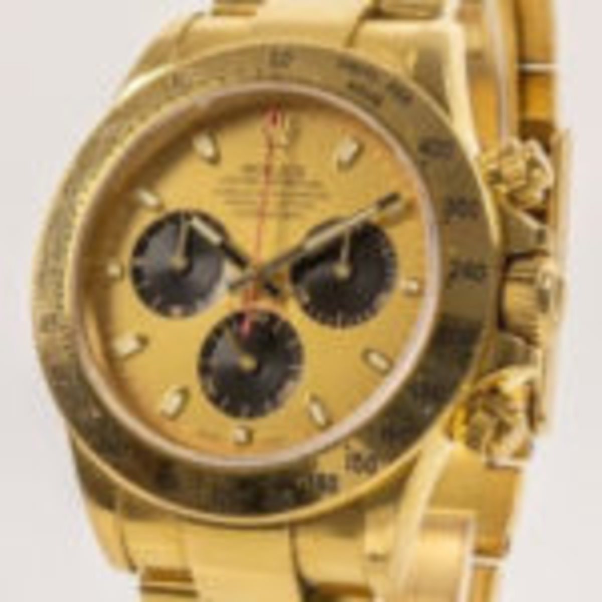 Lot 1 in the sale is a Rolex wristwatch: Rolex Cosmograph Daytona in 18K yellow gold, model 116528, 39mm case, serial no. D446753