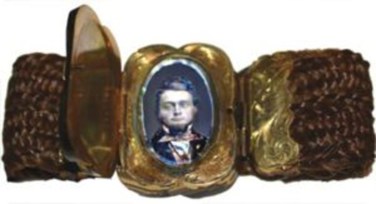 This hair bracelet, circa 1850s, contains the image of Captain Jacob J. Westervelt. The hair is from Jacob’s fiancé, Rachel Ann Voorhis whose initials “R.A.V.” are engraved on the hinged opening. It was common for young women to present their betrothed with bracelets, watch fobs or chains made of their own hair and elaborate gold fittings that bore their engraved initials. The hair is in perfect condition; if protected, human hair does not easily decay – you could say, hair yesterday, still here today.