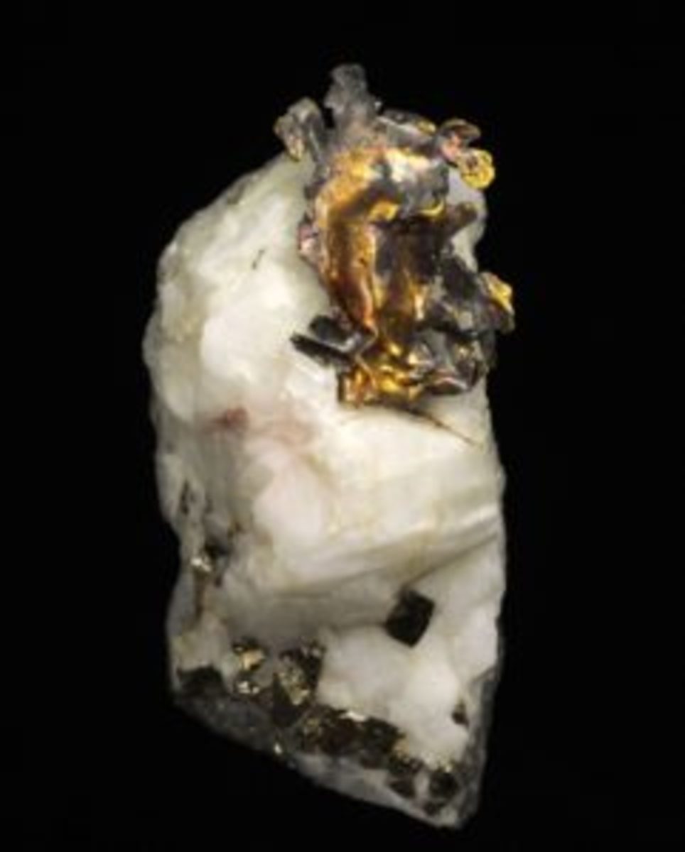 Mid-19th century gold in quartz aesthetic native gold specimen from northern Sierra Nevada in California, featuring a leaf gold in quartz matrix with pyrite crystals (est. $3,600-$5,400).