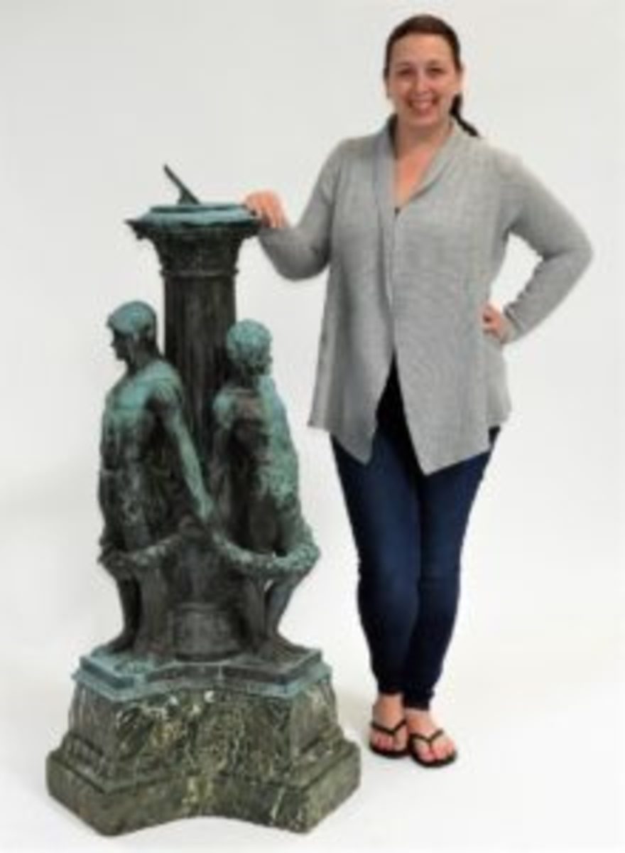  Significantly-sized bronze figural sundial up for bid. (All photos courtesy Bruneau & Co.)