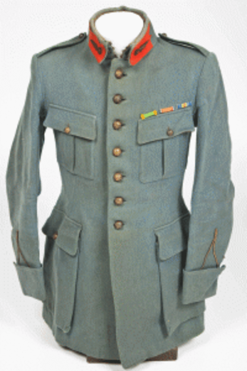 French military uniform, worn during World War II, fetch $2,100 during the spring auction at Thomaston Place Auction Galleries.