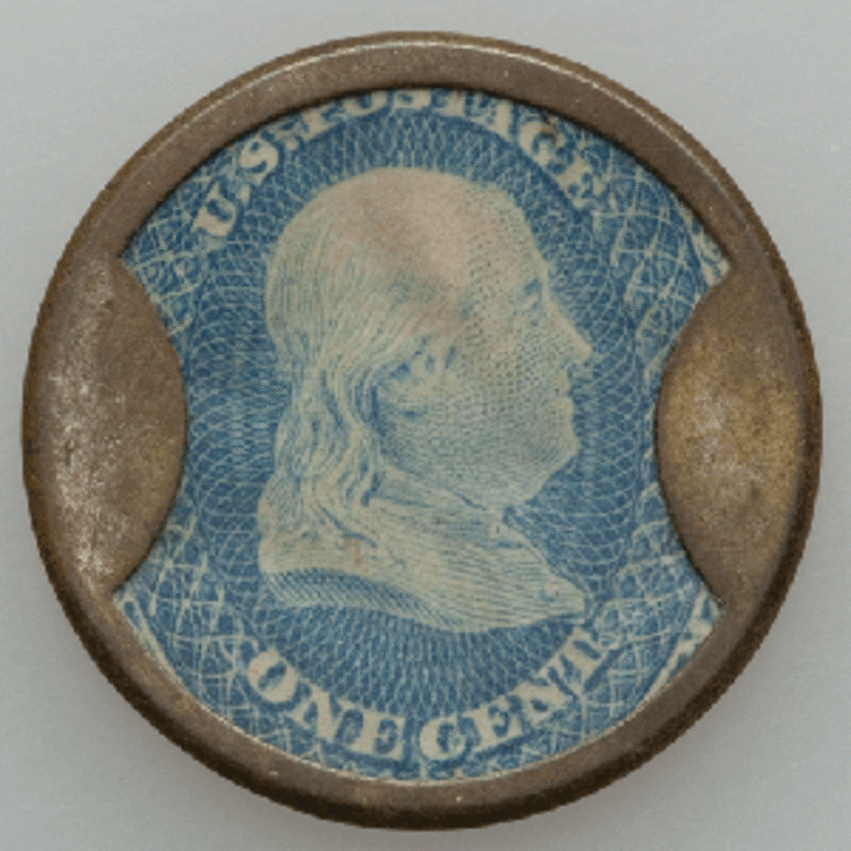 Backed encased Franklin 1-cent blue stamp