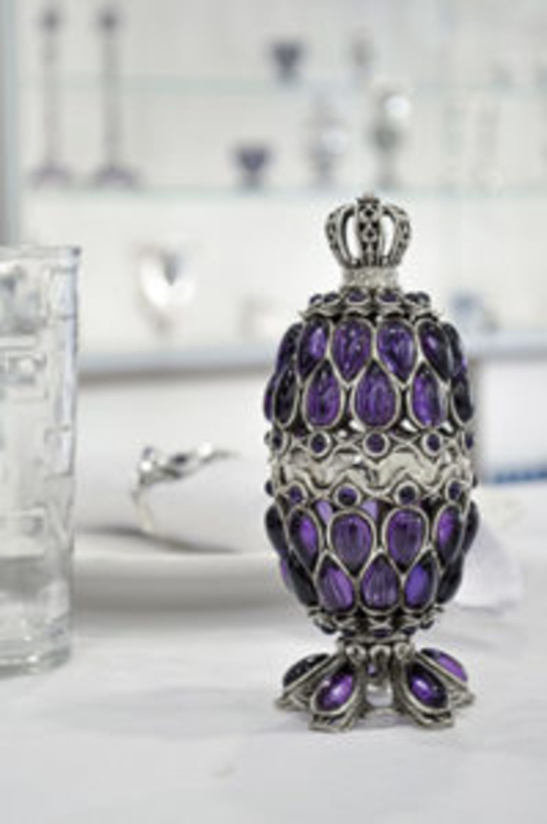 Sterling silver, hand-carved “Faberge” egg-shaped ritual spice box featuring 93 teardrop and circular amethysts, capped with regal crown. Courtesy www.nadavart.com