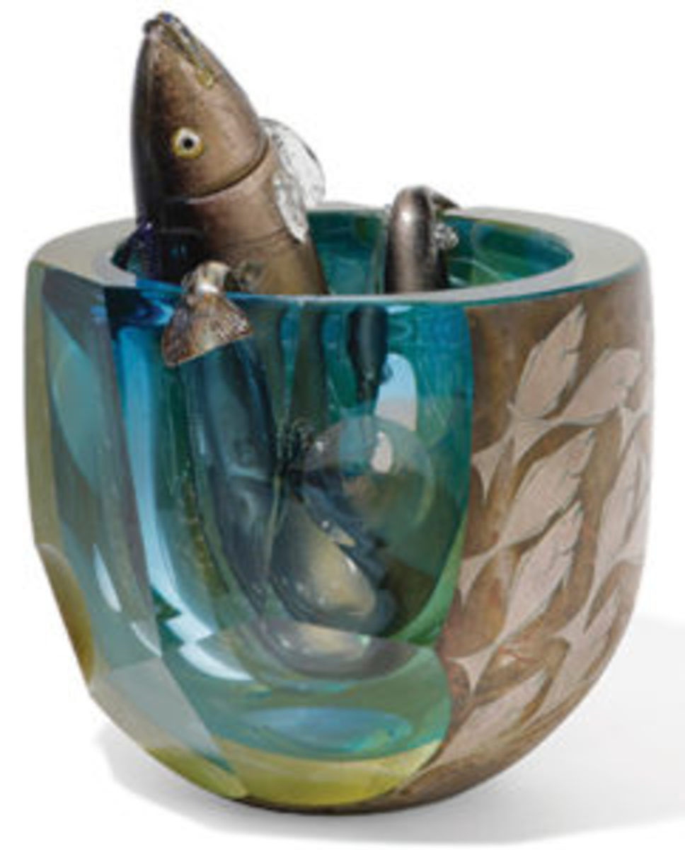  Glass creation by Hiroshi Yamano (Japanese, b. 1956), titled East to West Fish Catcher, No. 176 (2002), 17” h; estimate: $2,500-$3,500.