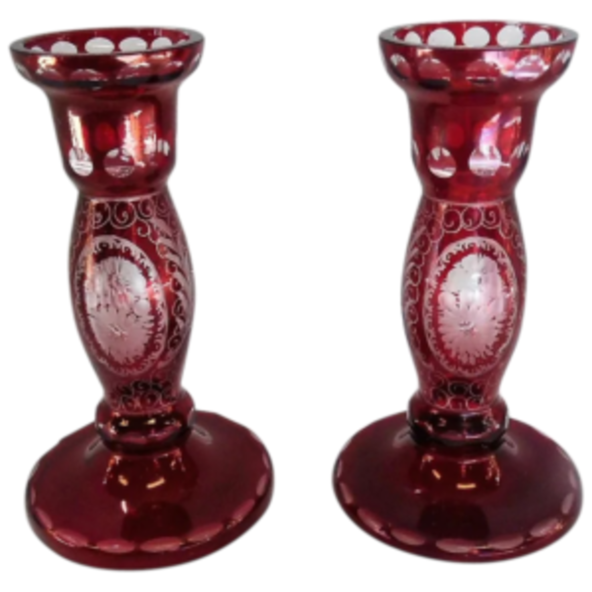  A stunning pair of ruby red candleholders adds a pretty pop of color to any table; $107. Courtesy of Bearski Gallery LLC: rubylane.com/shop/bearski-gallery