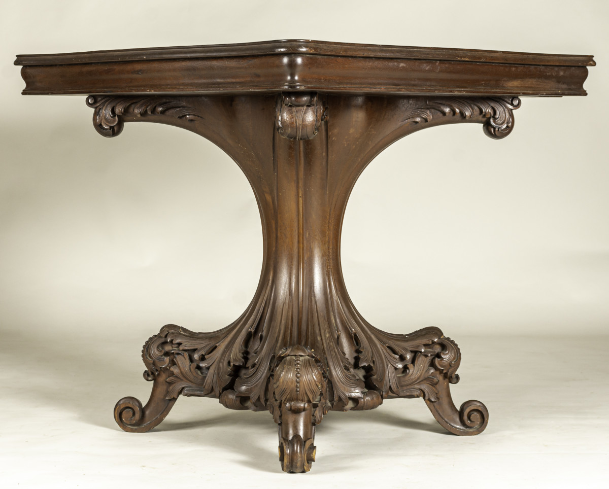 A Tobey Art Nouveau carved center table.