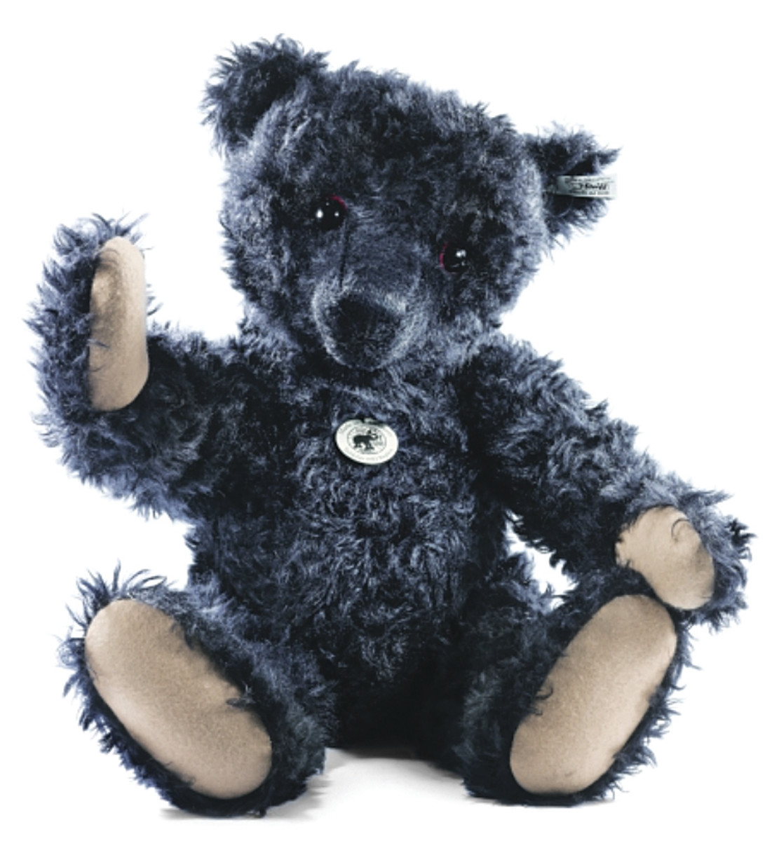 A replica of the famous black Titanic Mourning Teddy Bear by Steiff.