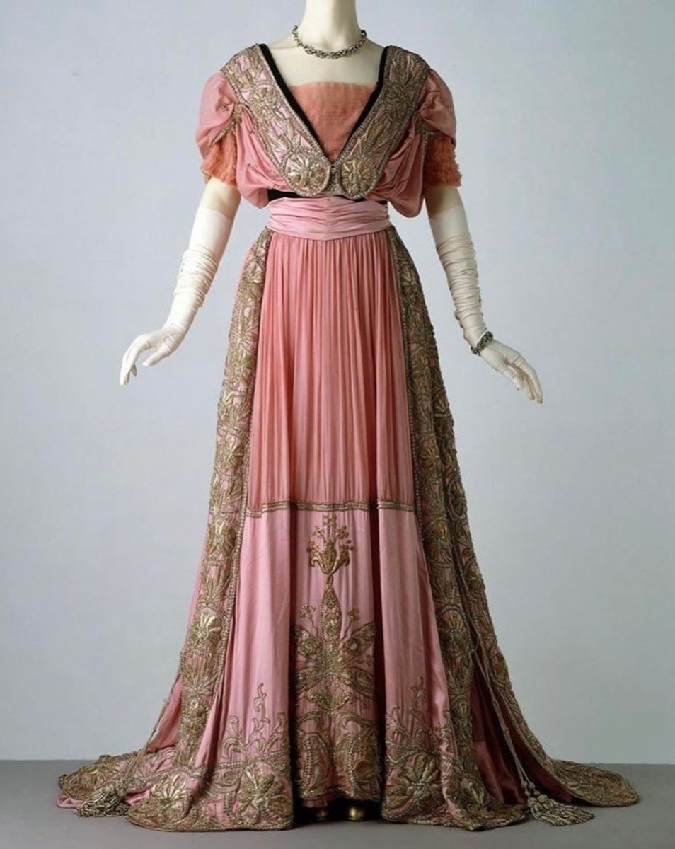 Satin evening dress with silk and silver-gilt embroidered panels, by Jays Ltd, London, c.1908.