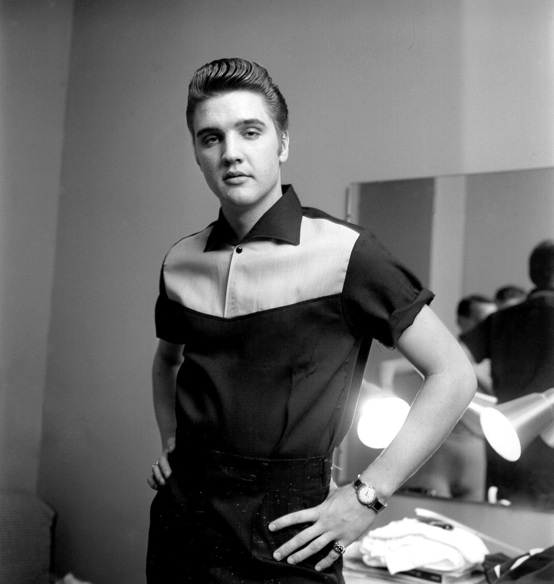 Looking clean cut, but with an edge, Elvis wears his signature style backstage at the Milton Berle Show in Burbank, California, on June 4, 1956.