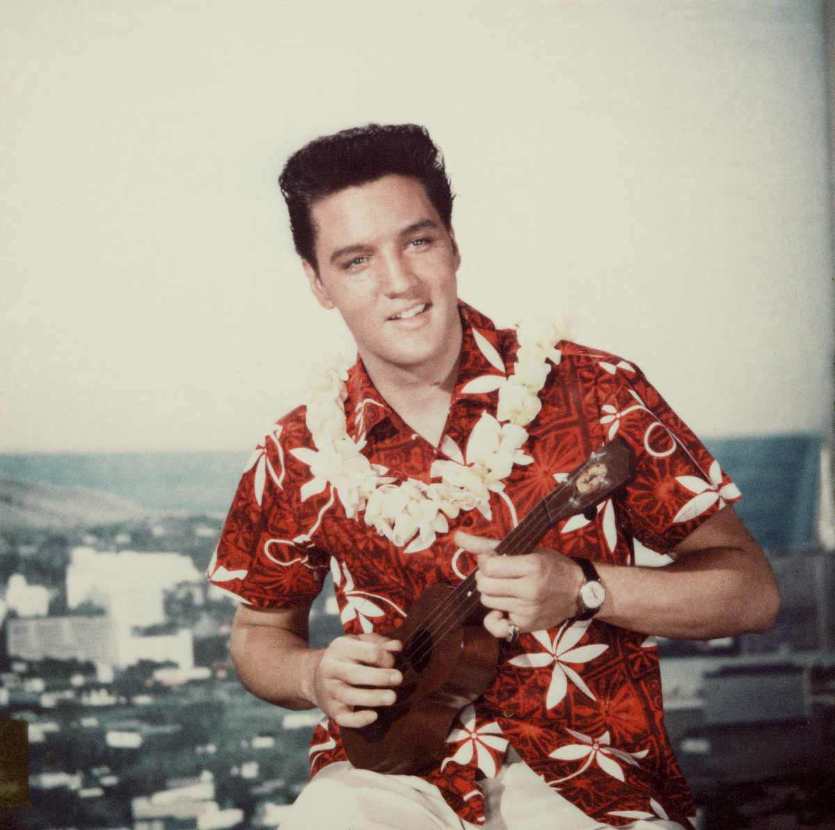 But you can’t very well make a movie called "Blue Hawaii" and not don a Hawaiian shirt. As shown here in a still from the 1961 movie, Elvis rocked those, too.