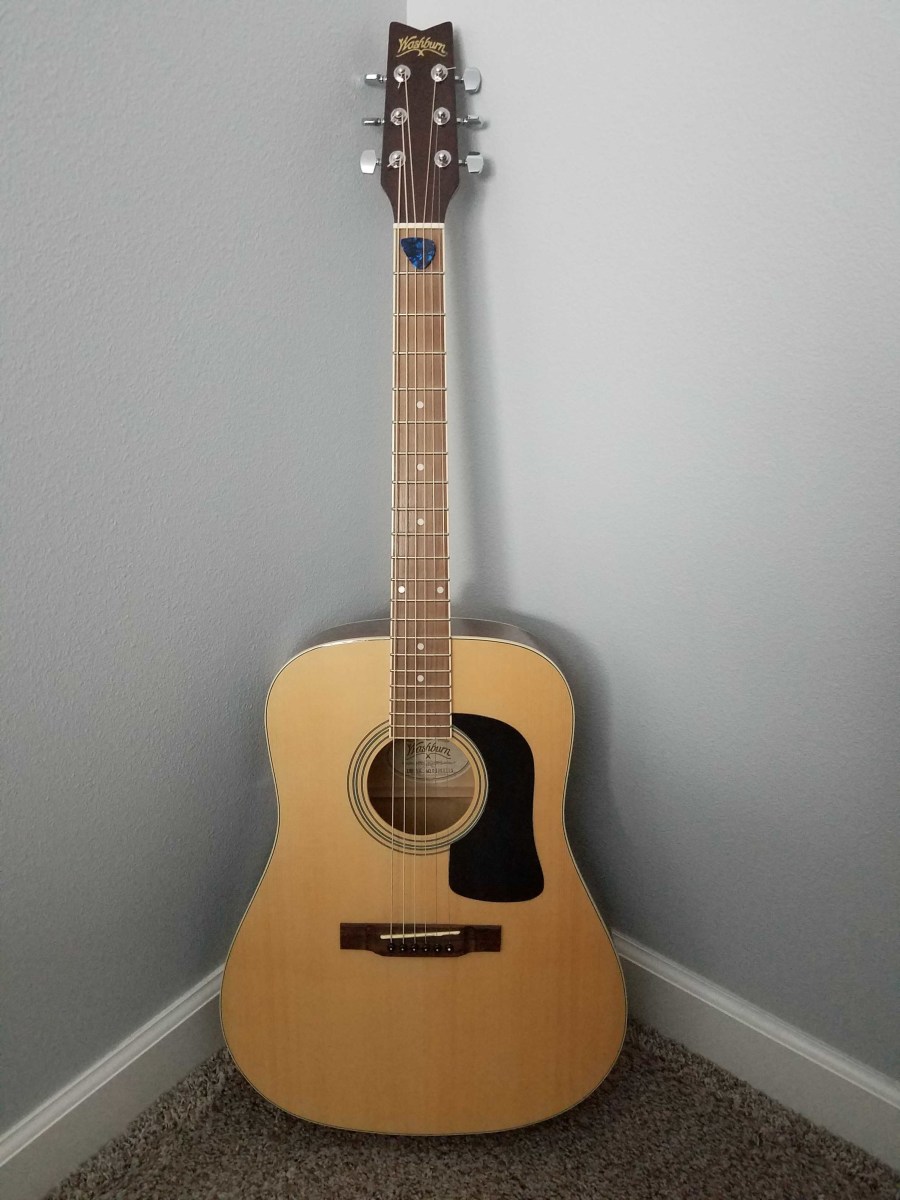 At the ready, my trusty -- and unplayed -- Washburn guitar bought at Dave's Guitar Shop in La Crosse, Wisconsin. 
