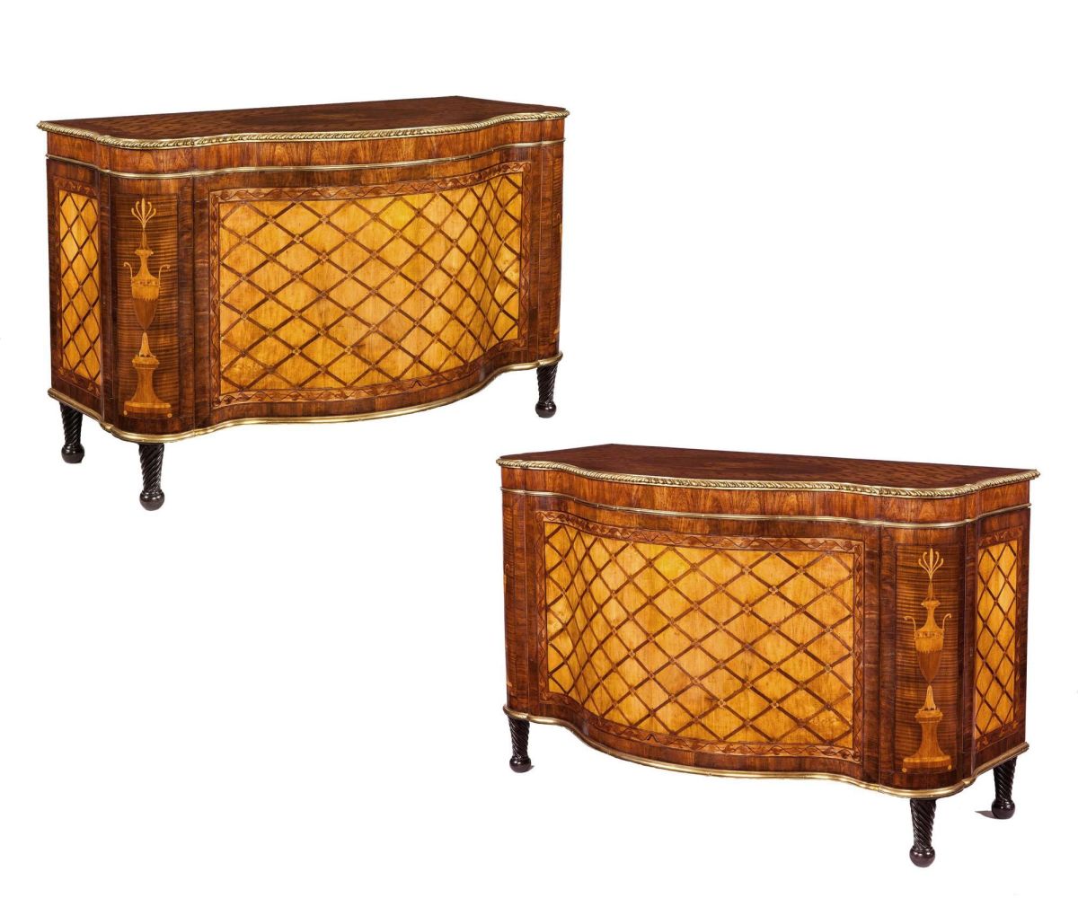 A pair of commodes attributed to Mayhew & Ince, circa 1775-78.