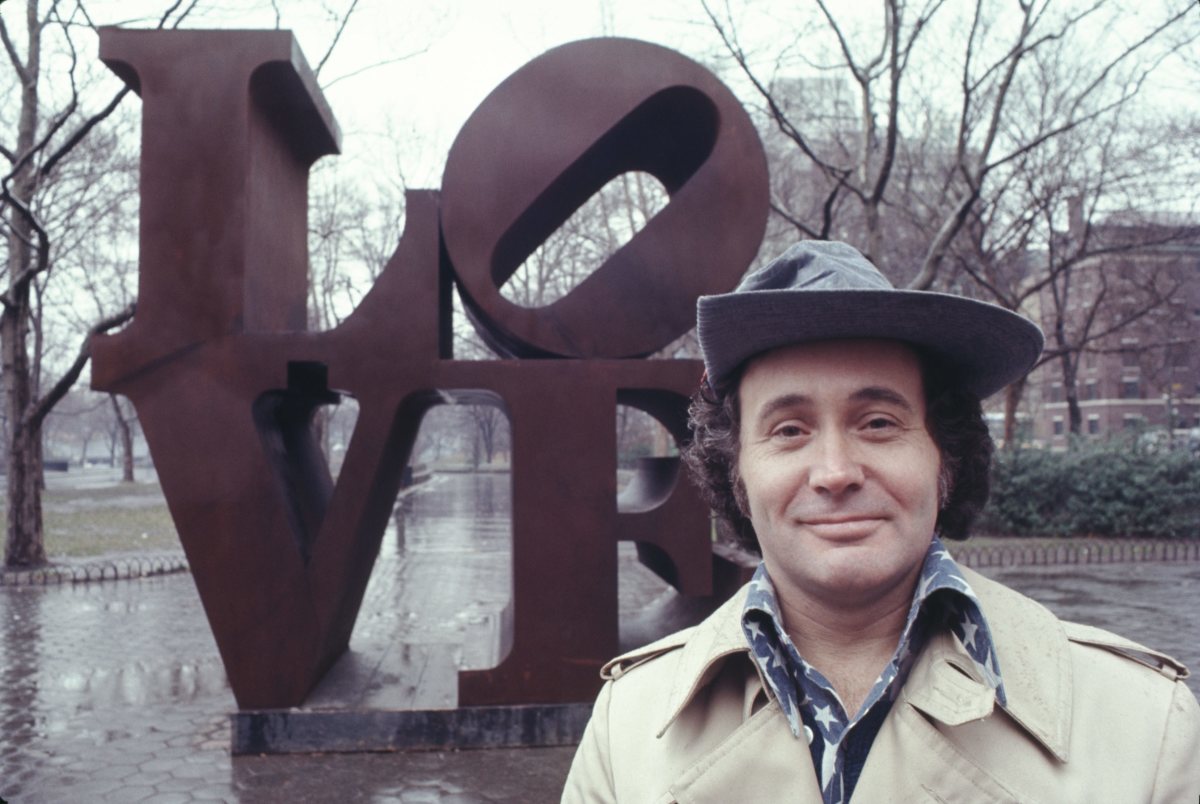 Robert Indiana with his LOVE sculpture in New York's Central Park in 1971.
