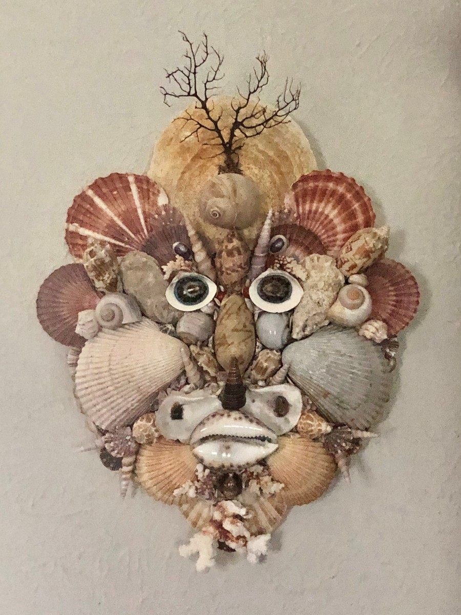 An honest-to-goodness seashell mask made in the style of Renaissance artists. See that in a thrift shop and there’s no passing it up. Right?