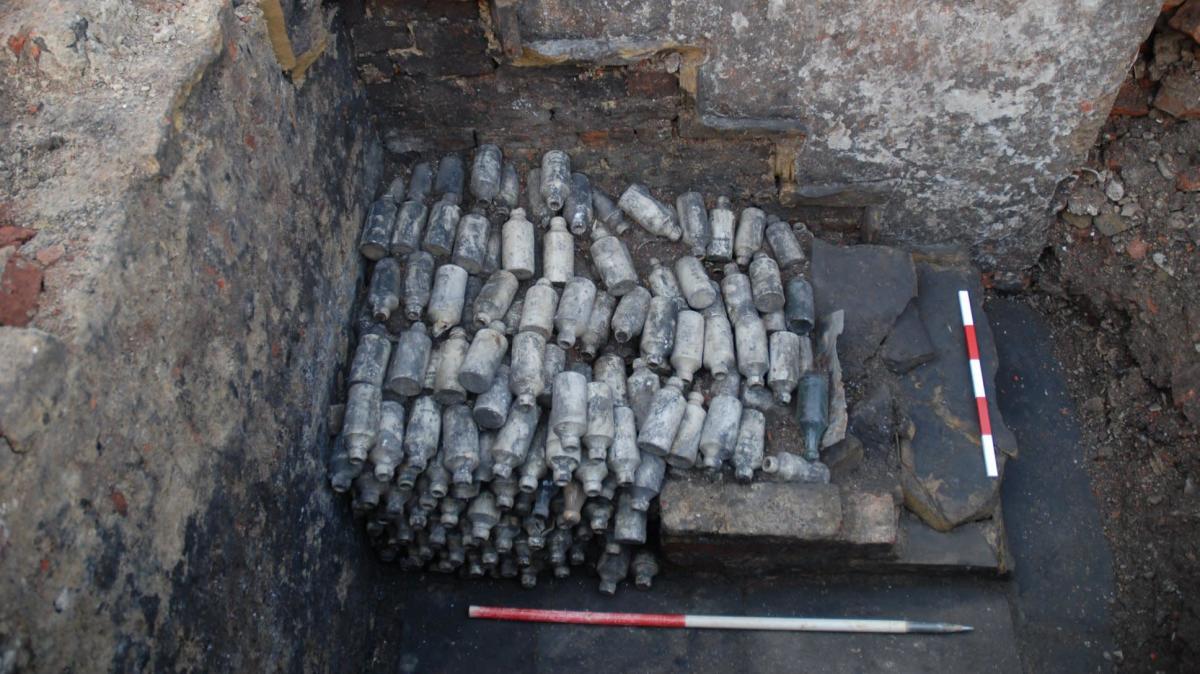 The more than 600 beer bottles found beneath the cellar staircase of an old brewery in Leeds, England.