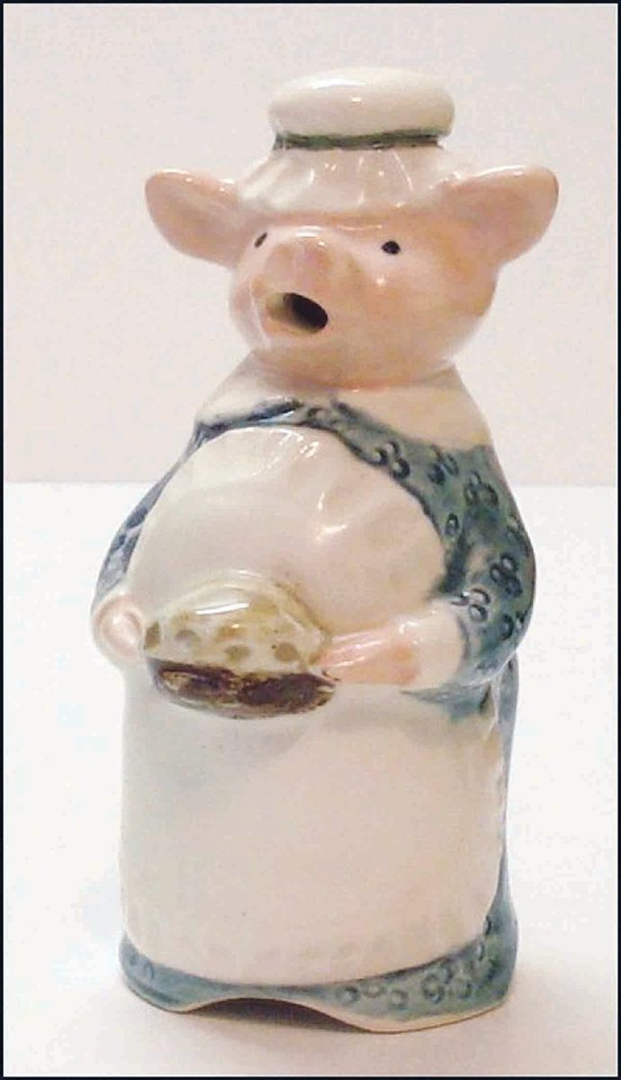A new Stuart Bass “Mrs. Pig in a Blue Dress,” painted by hand. No two Bass pie birds are alike and are highly collectible; $55.