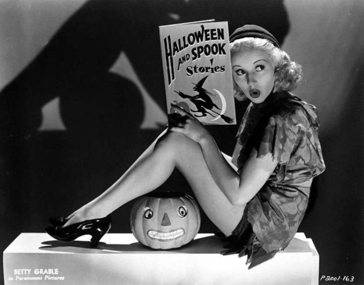 Betty Grable reads some frightening tales in this photo taken in 1938, several years before her rise to super stardom.